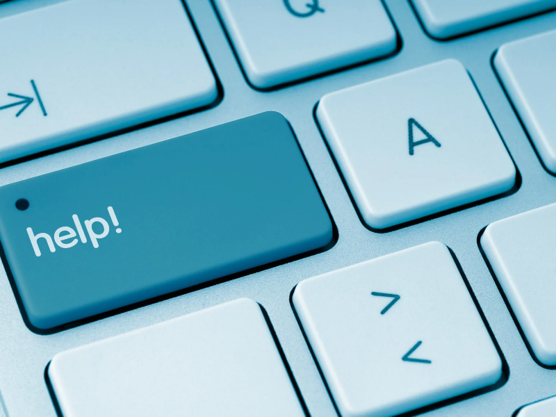keyboard with "help" written on a key